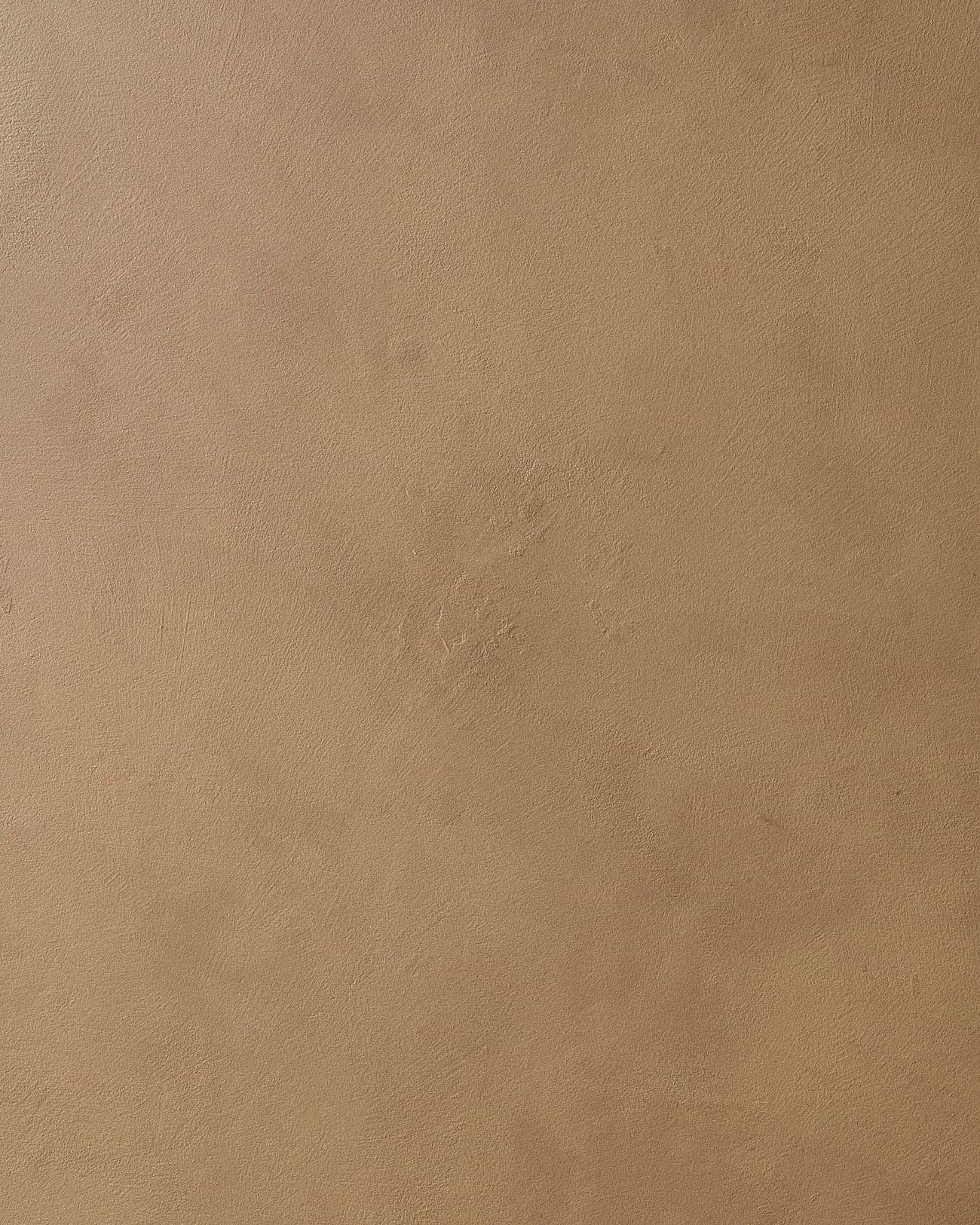 A StucVestre interior in a warm, mineral tone.